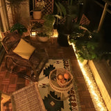 Outdoor embedded LED light strips with a close-up of the circular light pattern.